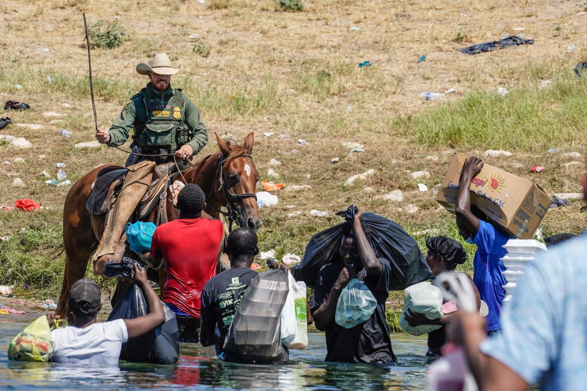 Haitian migrants try to cross the Rio Grande