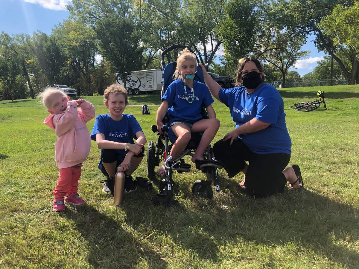 From left to right, Wish kids Bella Thomson, Mikayla Young and Avery Andres with Make-A-Wish coordinator Allyson Toye.