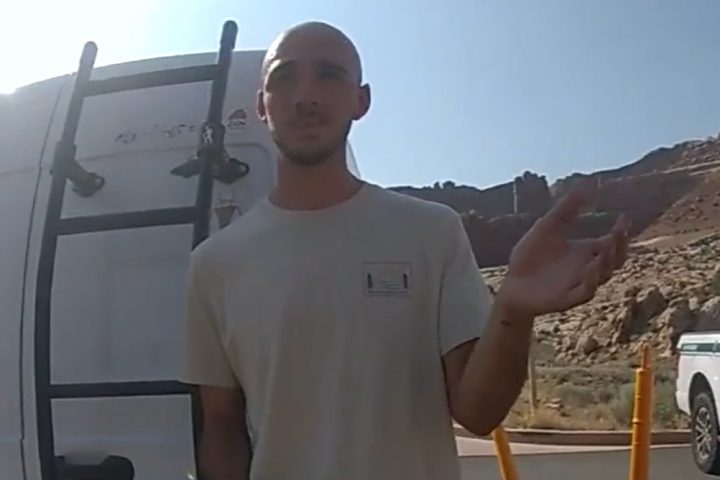 Brian Laundrie speaks to police after he and girlfriend Gabby Petito were pulled over in Arches National Park, Utah, on Aug. 12, 2021.