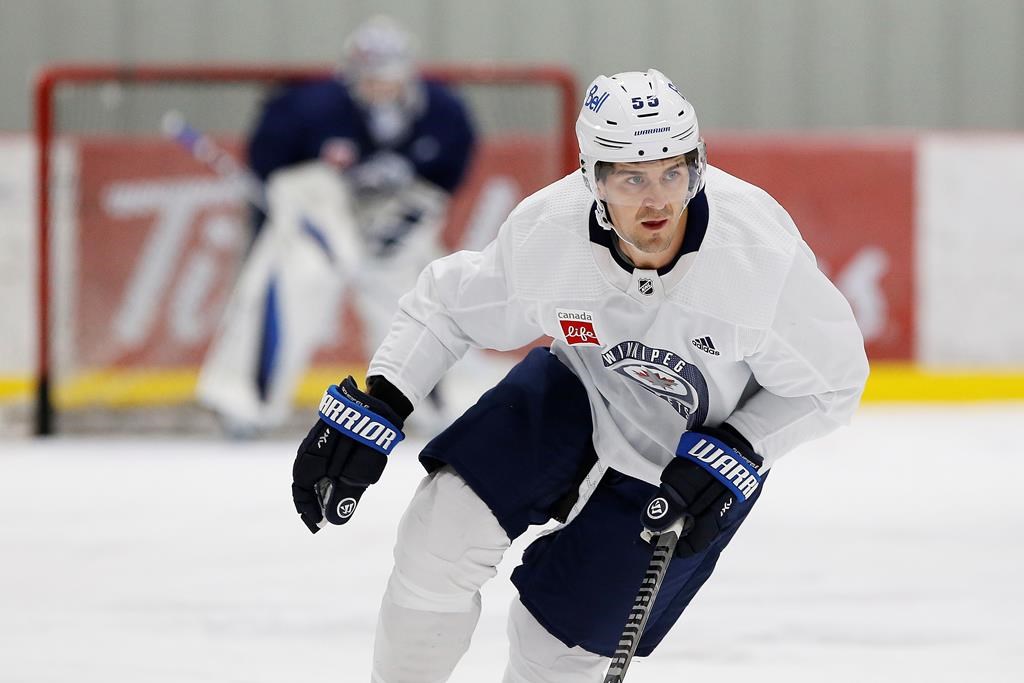 Winnipeg Jets’ Mark Scheifele (55) during NHL training camp practice in Winnipeg, Friday, Sept. 24, 2021.