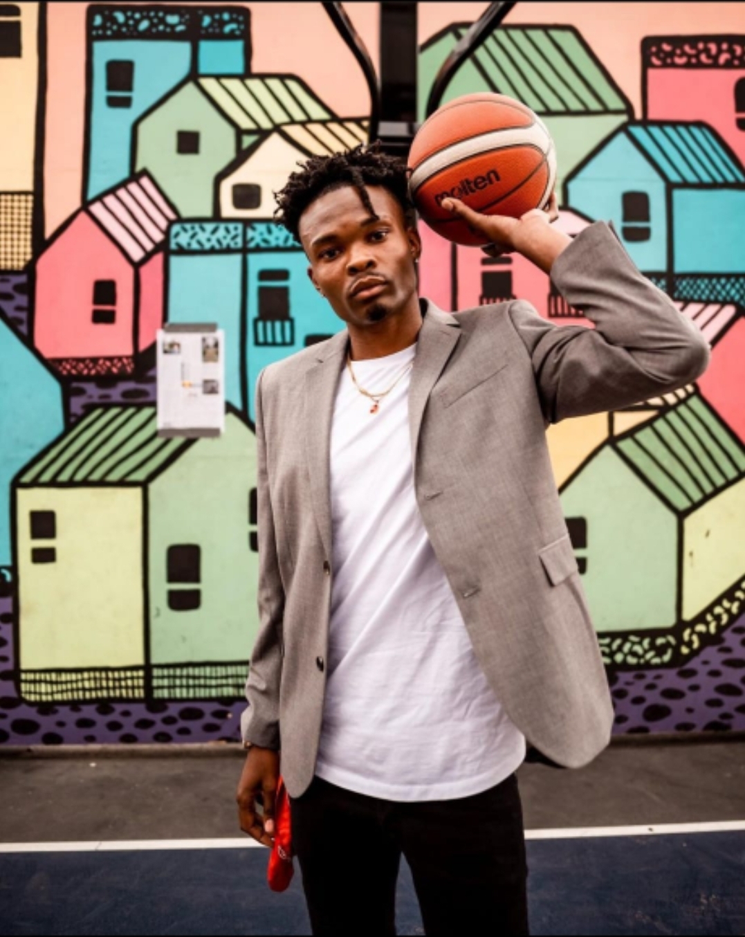 John Mitchell Smith Jr., 31, died after being shot outside a Calgary nightclub on Sunday, Oct. 10, 2021. Smith was an avid basketball coach and player.