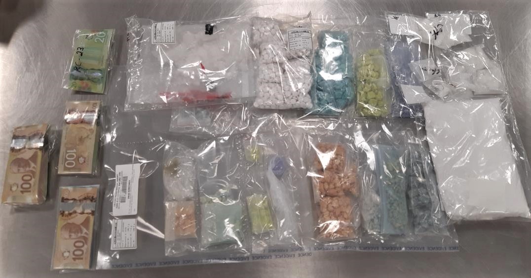 Three people have been charged following a two-month investigation by Calgary police that netted upwards of $400,000 worth of drugs and stolen property.