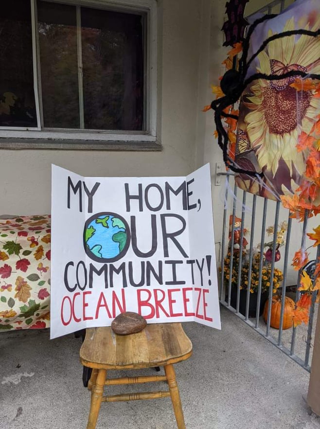 Ocean Breeze tenants are putting up signs to raise awareness about the issue.