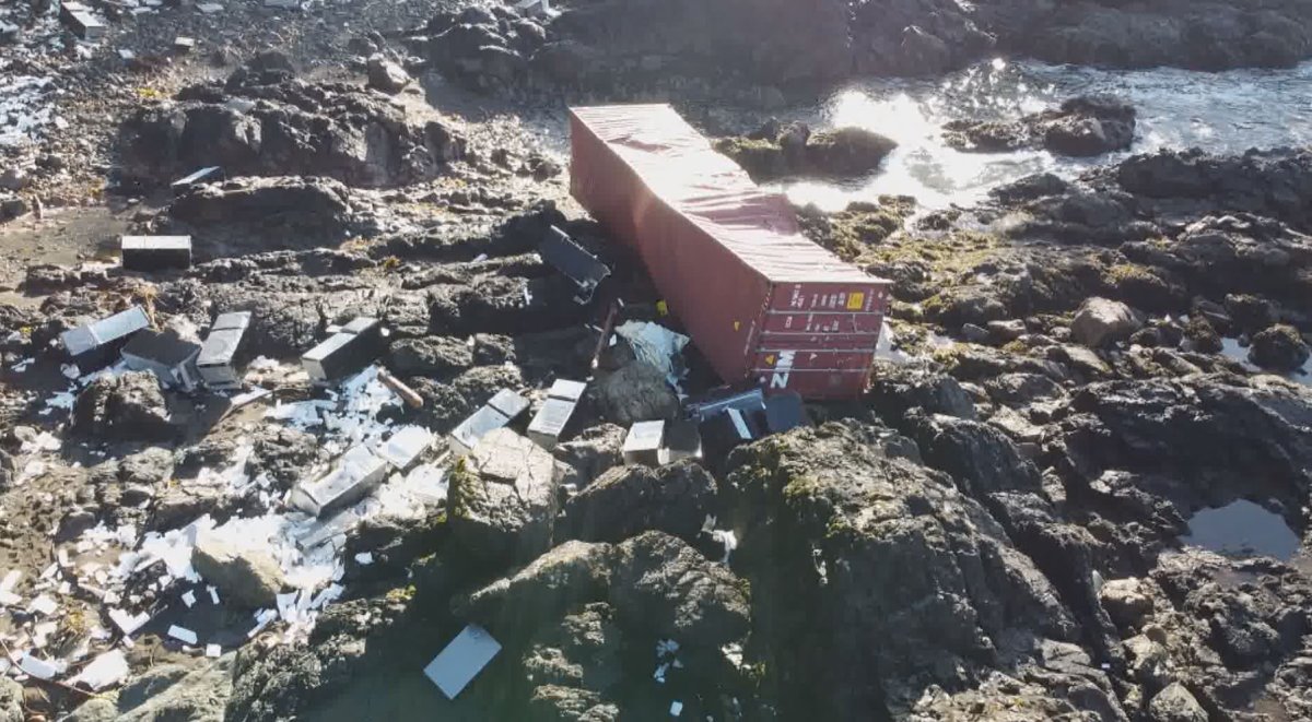 A wrecked cargo container is seen surrounded by debris on northwestern Vancouver Island on Friday. 
