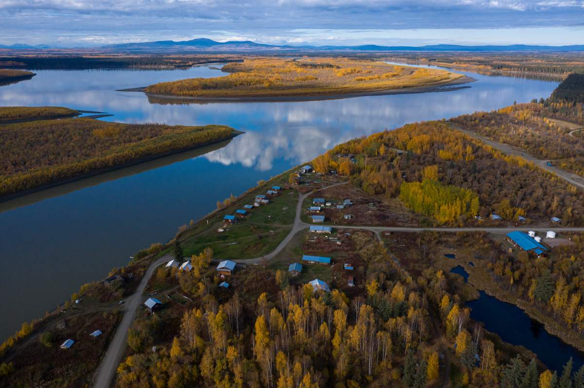 The Yukon River stretches past Stevens Village on Wednesday, Sept. 15, 2021, in Stevens Village, Alaska. Two salmon species have all but disappeared from Alaska's Yukon River this year, prompting the state to shut down fishing in an effort to save them. 