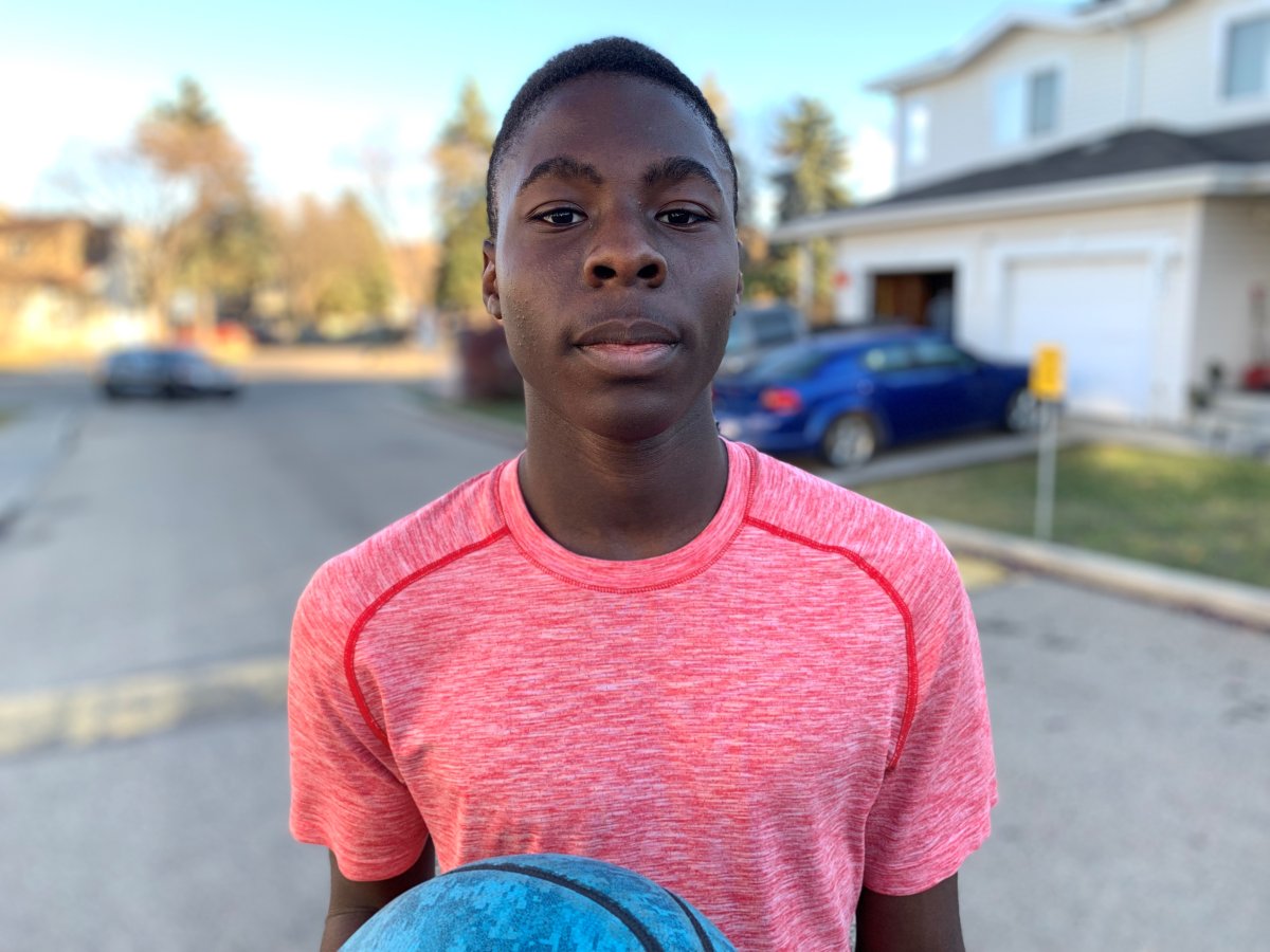 Story of Edmonton teen gifted basketball net from community spurs Kelly ...