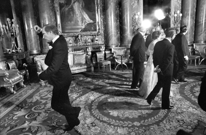 Pierre Trudeau pirouettes behind Queen Elizabeth II during a May 7, 1977, picture session at Buckingham Palace in London, England.