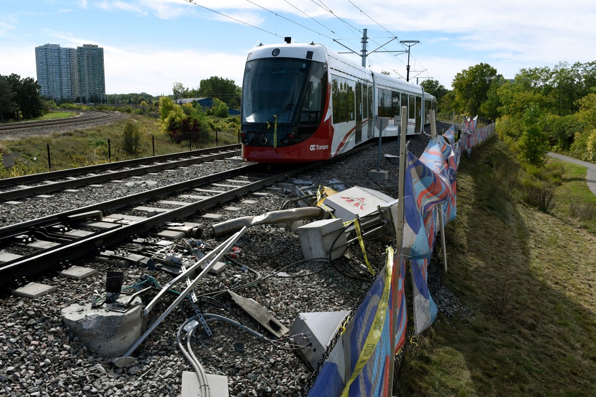 An OC Transpo O-Train is seen west of Tremblay LRT Station  In Ottawa on Monday, Sept. 20, 2021 after it derailed on Sunday. The city rejected Rideau Transit Group's proposed plan for returning the LRT to service.