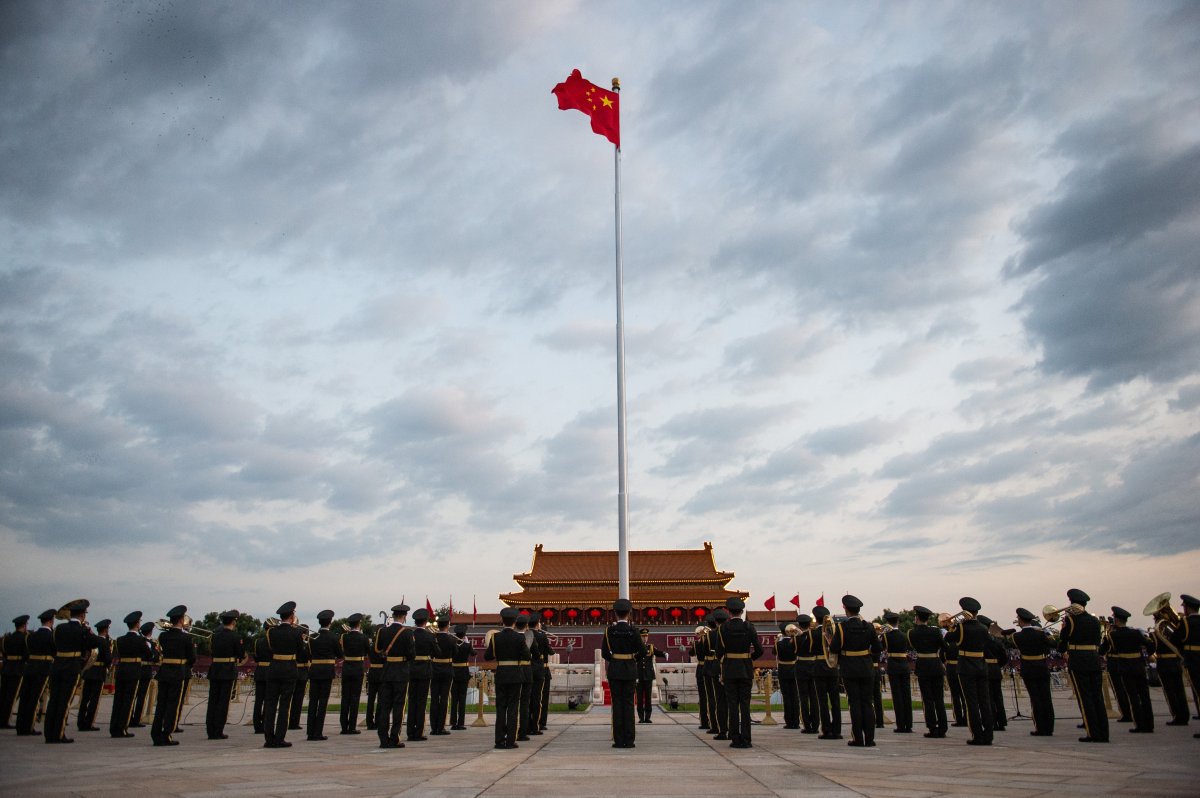 BEIJING, Oct. 1, 2021  A flag-raising ceremony to celebrate the 72nd anniversary of the founding of the People's Republic of China is held at the Tian'anmen Square in Beijing, capital of China, Oct. 1, 2021.