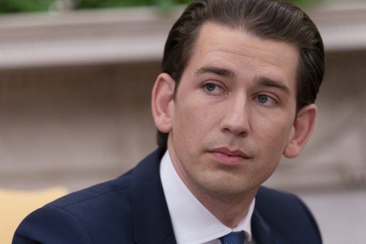 Austrian chancellor steps down to save coalition amid corruption probe