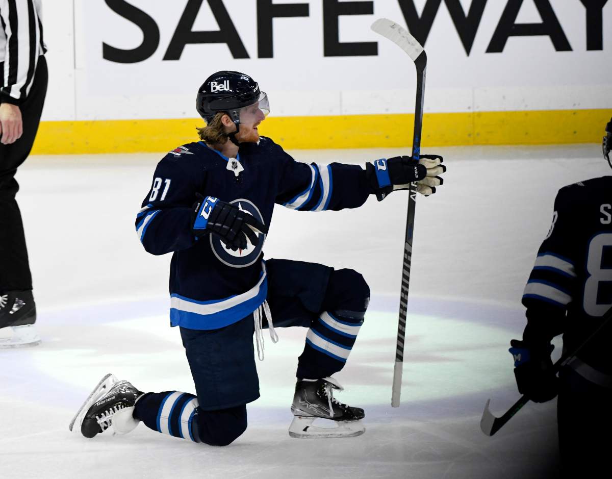 The Winnipeg Jets’ Kyle Connor (81) celebrates his goal against the Nashville Predators during the third period of NHL action in Winnipeg on Saturday, Oct. 23, 2021.