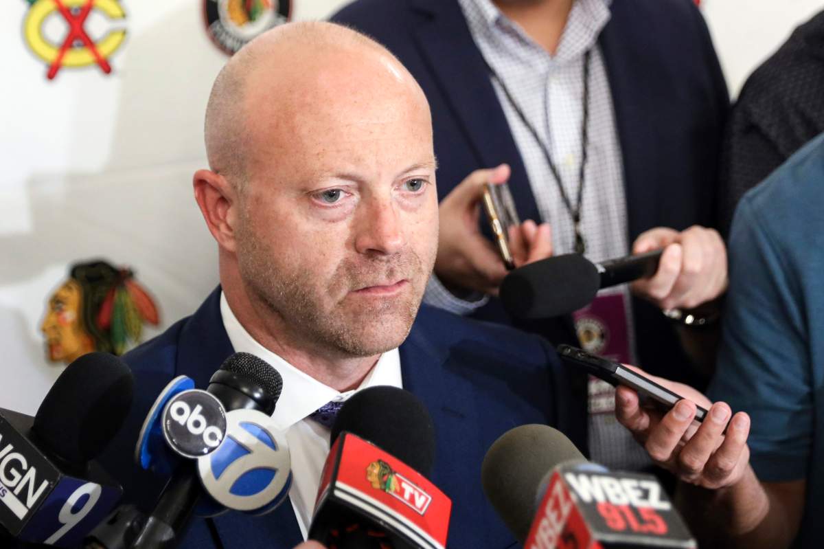 In this July 26, 2019 file photo, Chicago Blackhawks senior vice president and general manager Stan Bowman speaks to the media during the NHL hockey team's convention in Chicago.