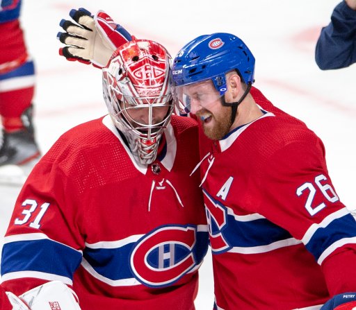 Montreal Canadiens defenceman Jeff Petry (26) celebrates with goalie Carey Price.
