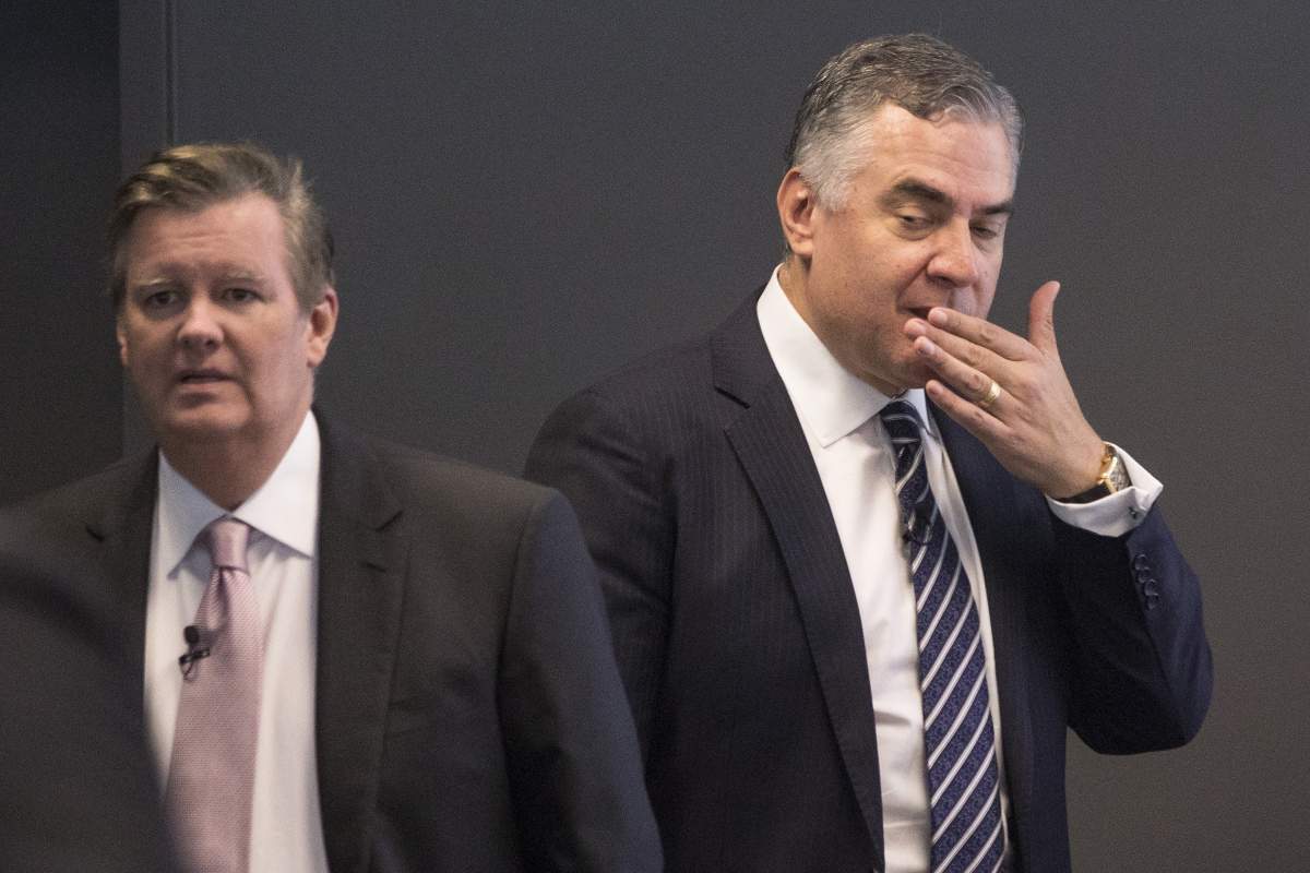 Rogers President and CEO Joe Natale, right, and Chair of the Board Edward Rogers attend the company’s AGM in Toronto on Thursday, April 18, 2019.