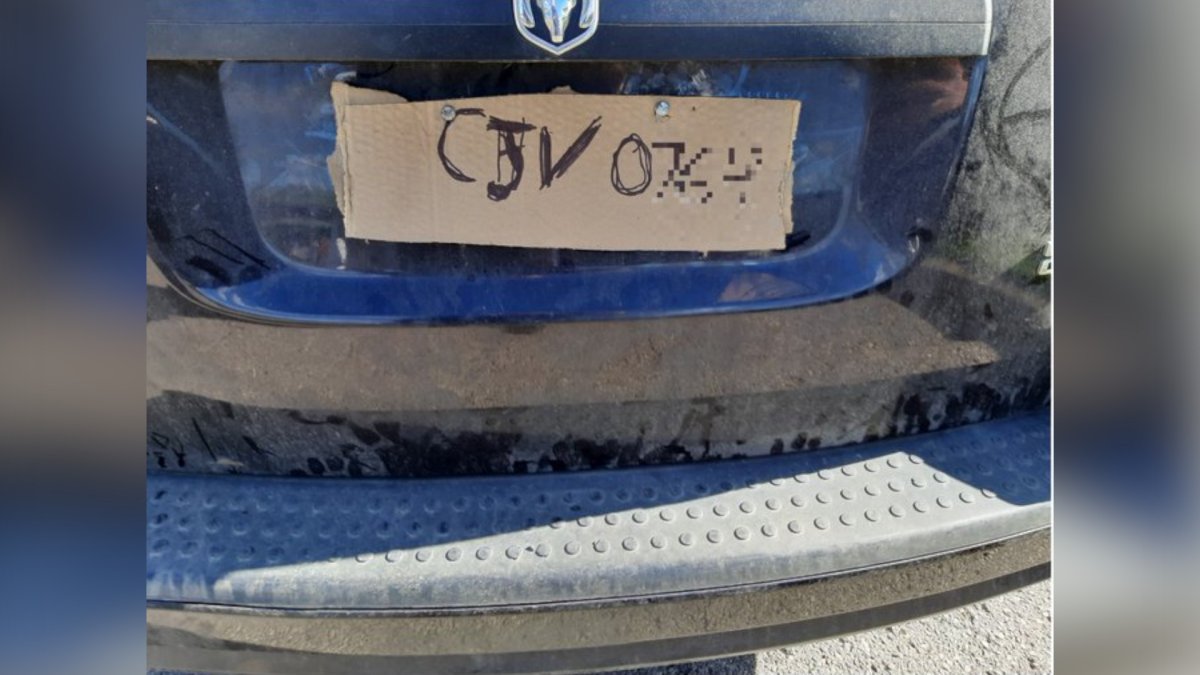 OPP have charged a driver who was spotted with a licence plate made of cardboard with the vehicle's registration written out in felt marker on Oct. 18, 2021.