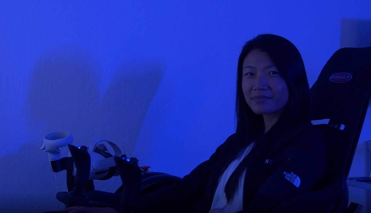 Eleanor Li, plant manager at Opener, in a flight simulator at the company headquarters in Palo Alto, Calif.