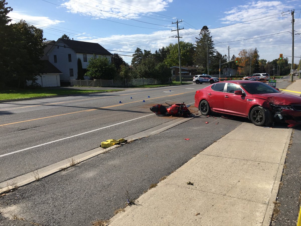 A motorcycle lies on its side after colliding with a vehicle in Kingston's west end.
