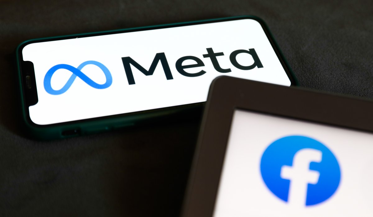 Meta logo displayed on a phone screen and Facebook icon displayed on a laptop screen are seen in this illustration photo taken in Krakow, Poland on Oct. 29, 2021.