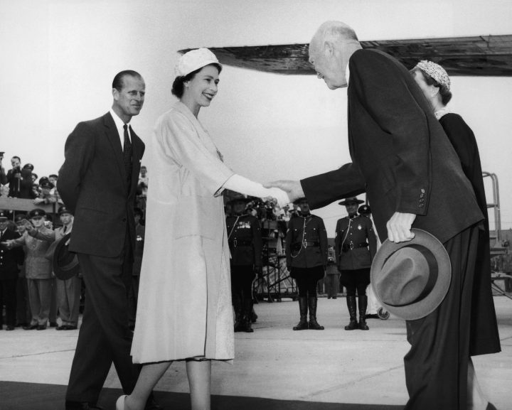 Queen Elizabeth greets U.S. President Dwight D. Eisenhower (1890 – 1969) before they take part in the opening ceremony of the St. Lawrence Seaway at Lambert Lock, Montreal, June 26, 1959. On the left is Prince Philip, Duke of Edinburgh.