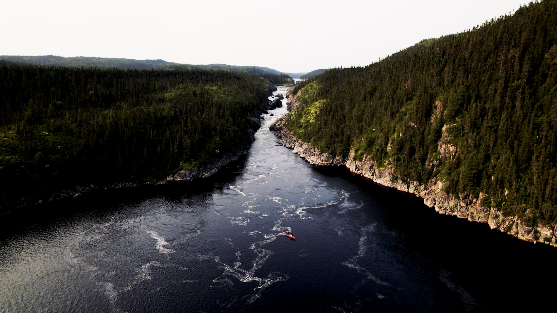 Danny Peled paddles a canoe on Magpie river.