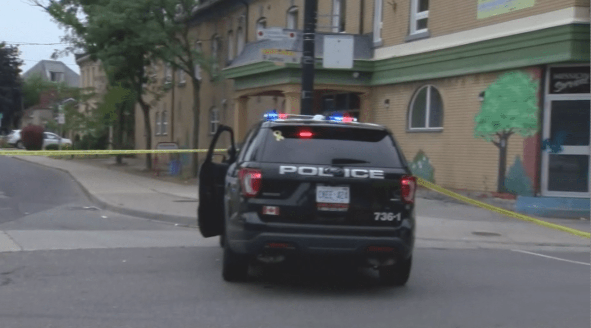 Hamilton police investigate the city’s 12th homicide of 2021 which occurred near a parking lot at Mission Services, located on James Street North, just north of Barton Street on Aug. 8, 2021.