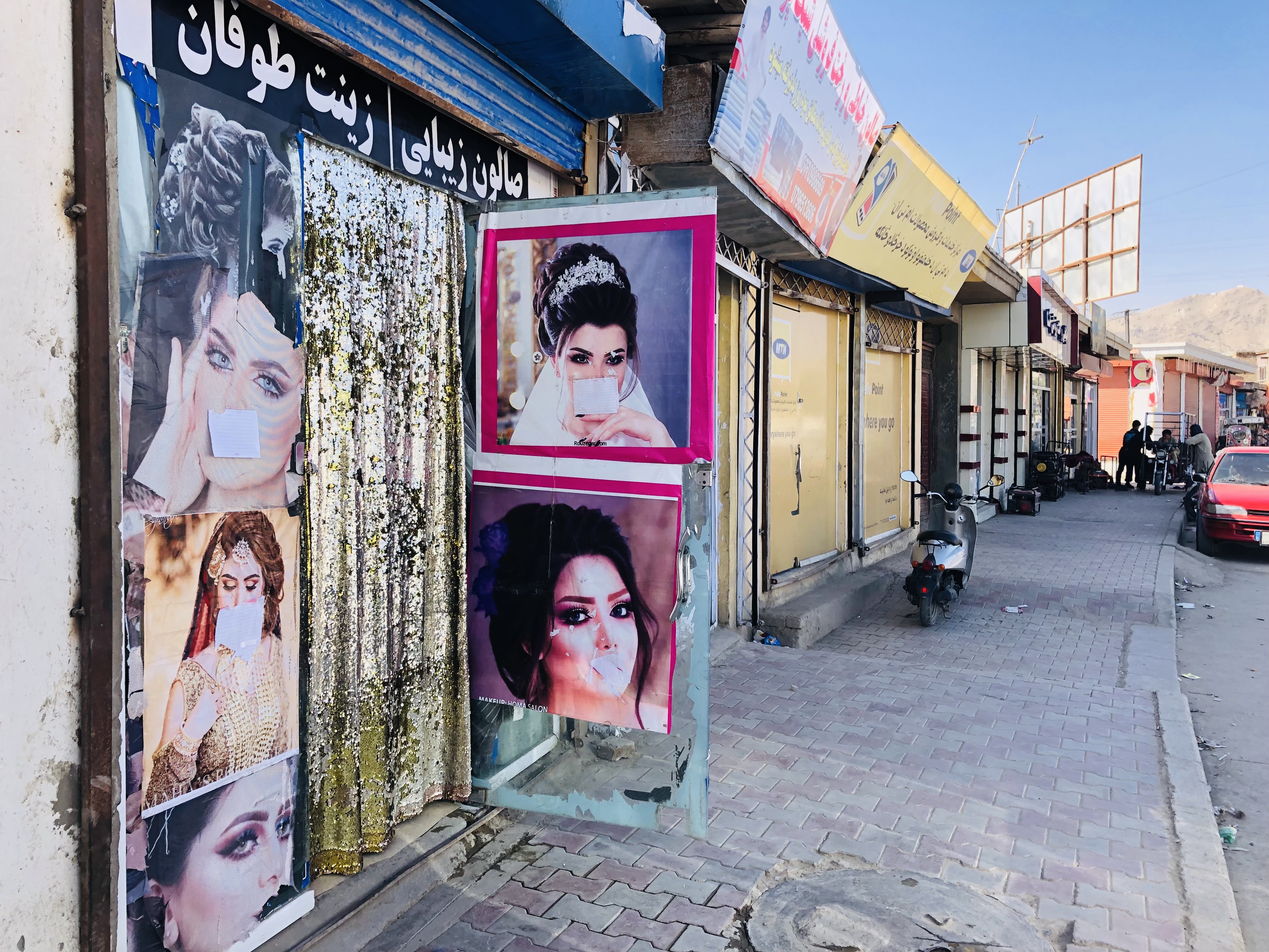 Photos of women covered up in Taliban-controlled Kabul.