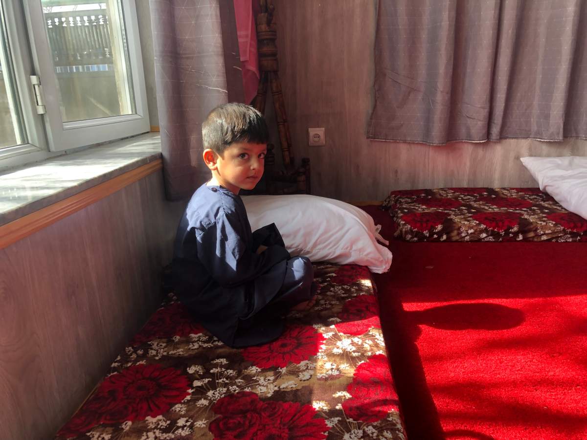 Boy at a Kabul safe house for Afghans awaiting evacuation to Canada.