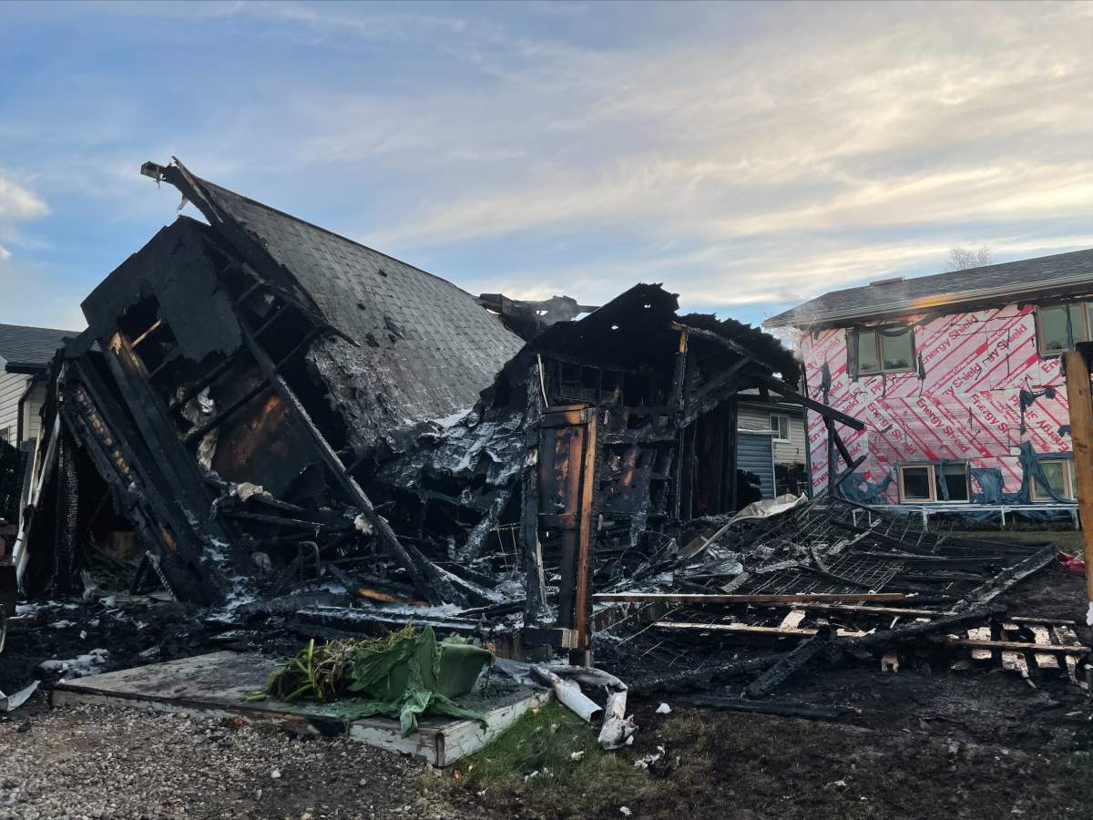 The aftermath of an early morning garage fire on Oct. 9, 2021 in the northeast community of Martindale.
