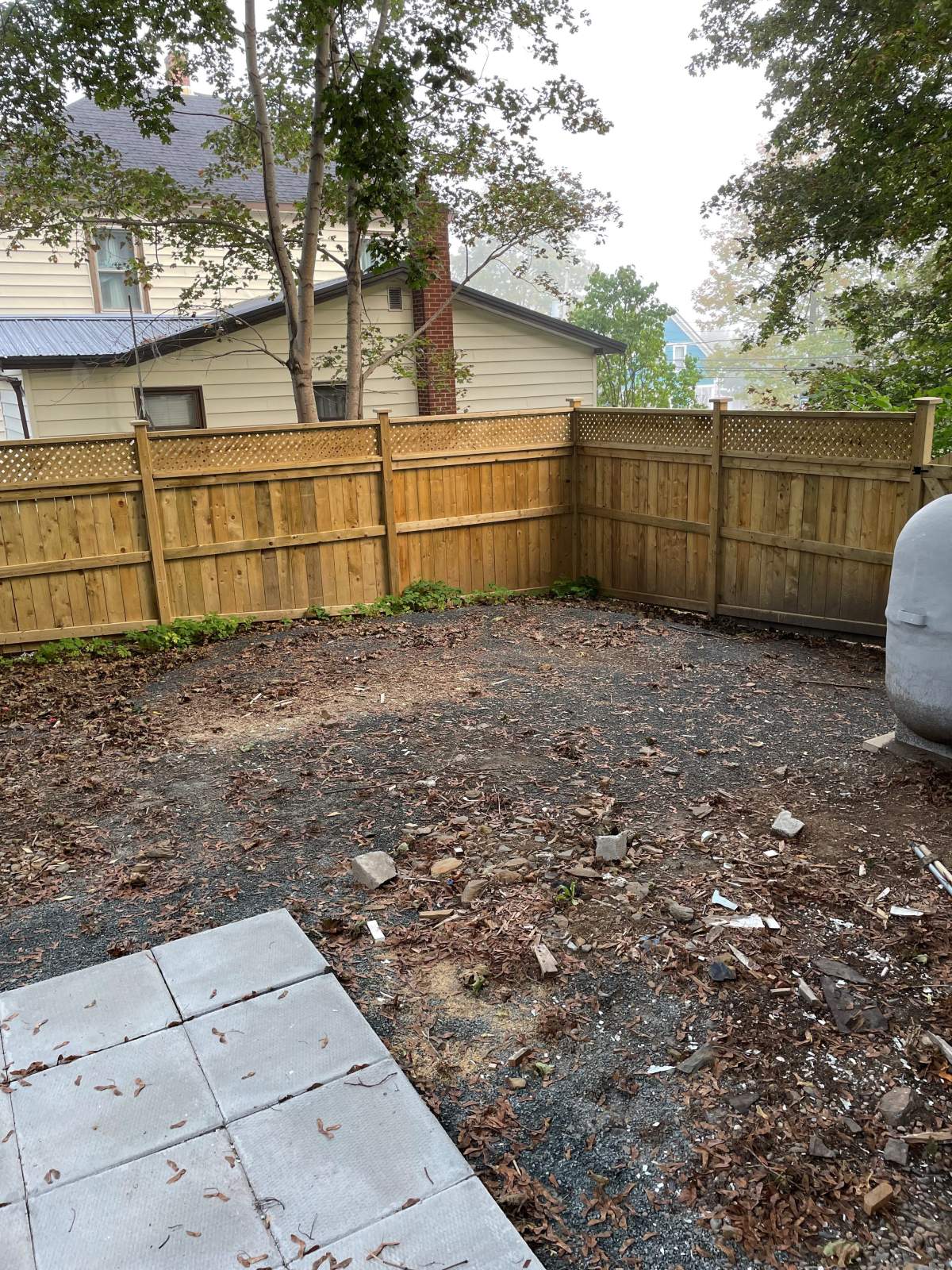 Karen Wright describes her new backyard as "a gravel pit" and a "disappointment."