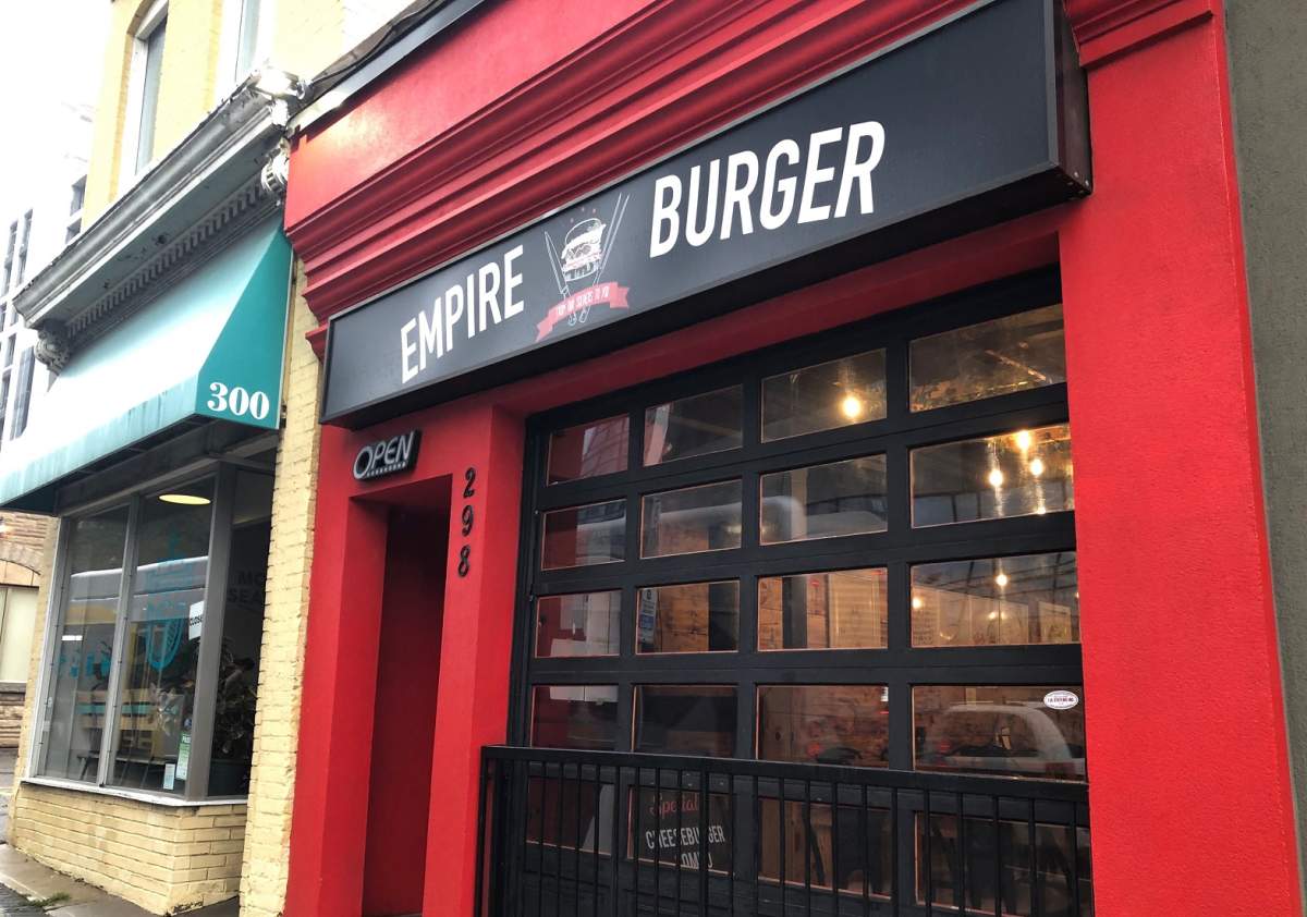 Empire Burger is the first Hamilton business to be charged under the Reopening Ontario Act for failing to abide by the provincial vaccine verification policy.