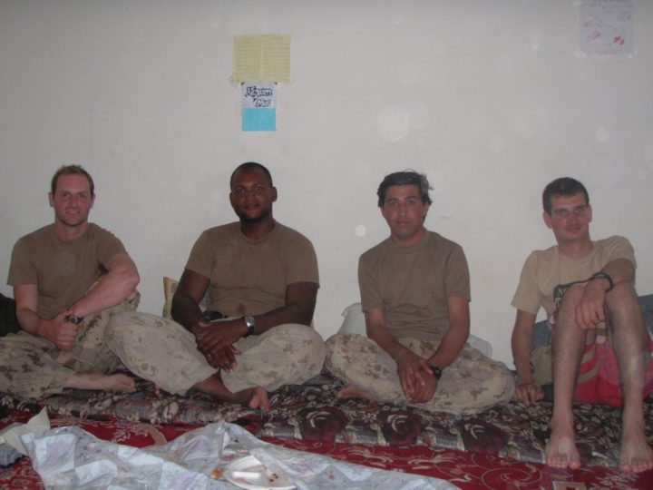 Haqmal (pictured third from the left) worked as an interpreter for the Canadian army in Afghanistan