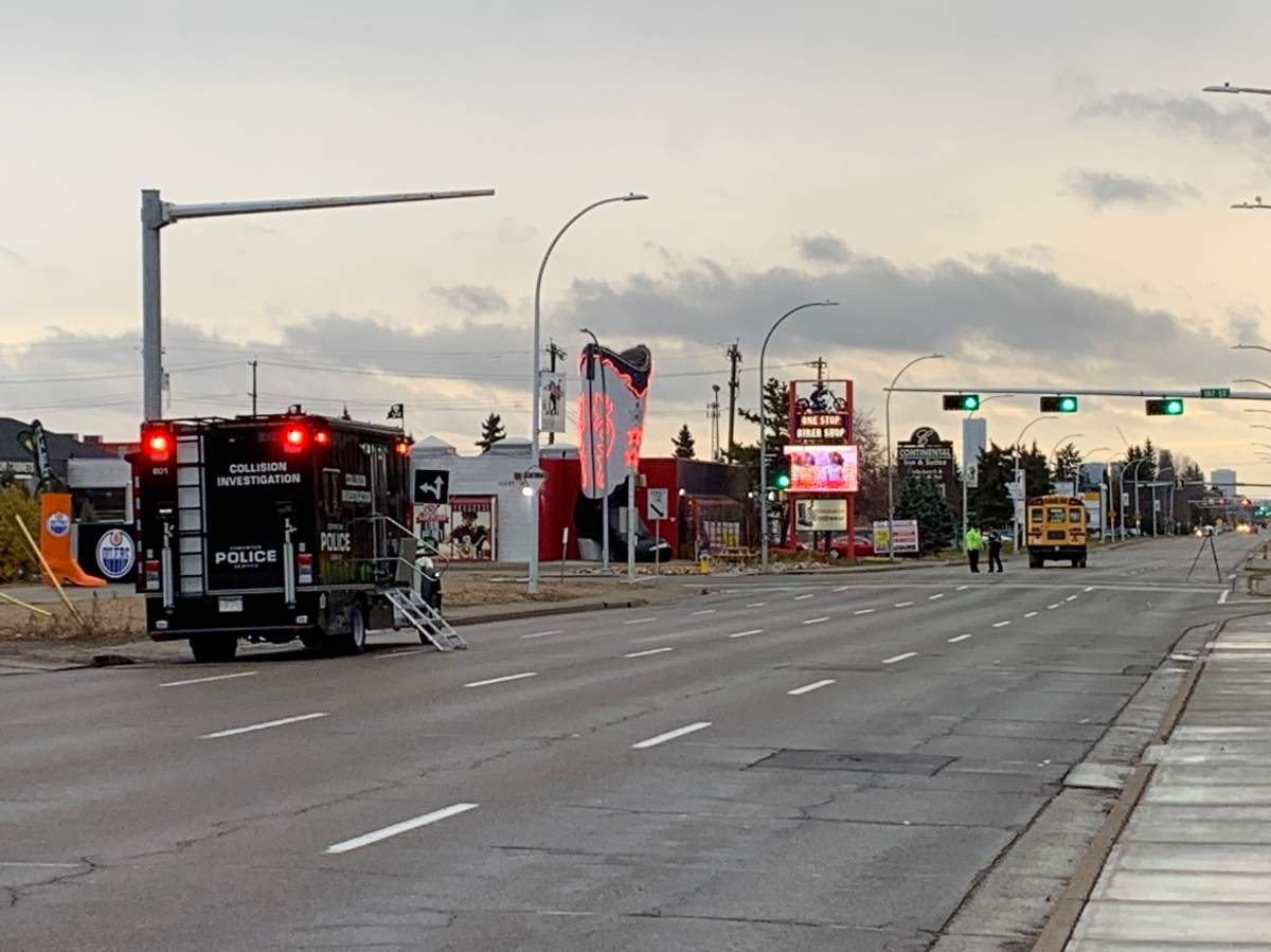 A pedestrian collision involving a teenage girl and a school bus shut down 100 Avenue near 167 Street in west Edmonton on Monday, Oct. 25, 2021.