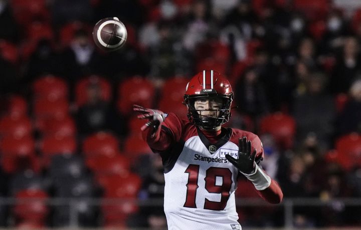 Calgary Stampeders quarterback Bo Levi Mitchell attempts a pass during first half CFL action against the Ottawa Redblacks, Friday, October 29, 2021 in Ottawa.