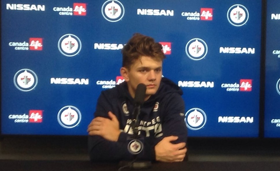 Winnipeg Jets rookie forward Cole Perfetti speaks with media about making his NHL debut. /Kelly Moore CJOB