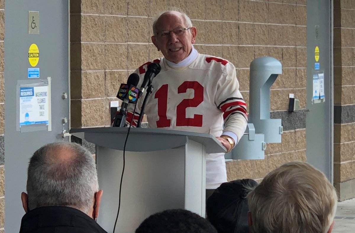 Russ Jackson, wearing his 1969 Ottawa Rough Riders Grey Cup jersey, speaks at the unveiling of the Russ Jackson Football Field in Hamilton, Ont.