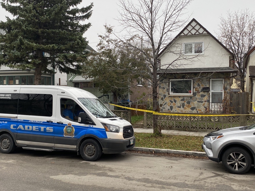 Winnipeg police on scene at a home at 310 Toronto Street Thursday.