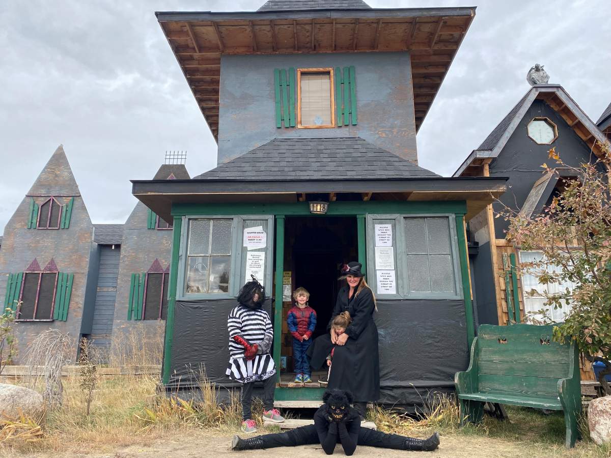 Staff outside the haunted mansion at Creepy Hollow on October 22, 2021.