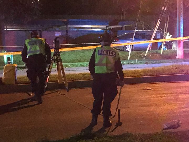 Investigators at the scene of a fatal collision in the area of Don Mills Road and The Donway on Wednesday.