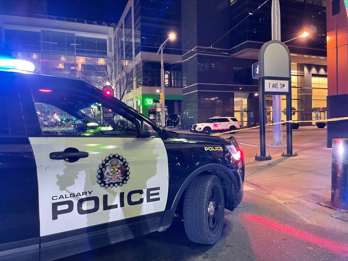 Calgary police cordon off a section of the downtown core Friday, Oct. 15, 2021 as officers investigate attacks in the area.