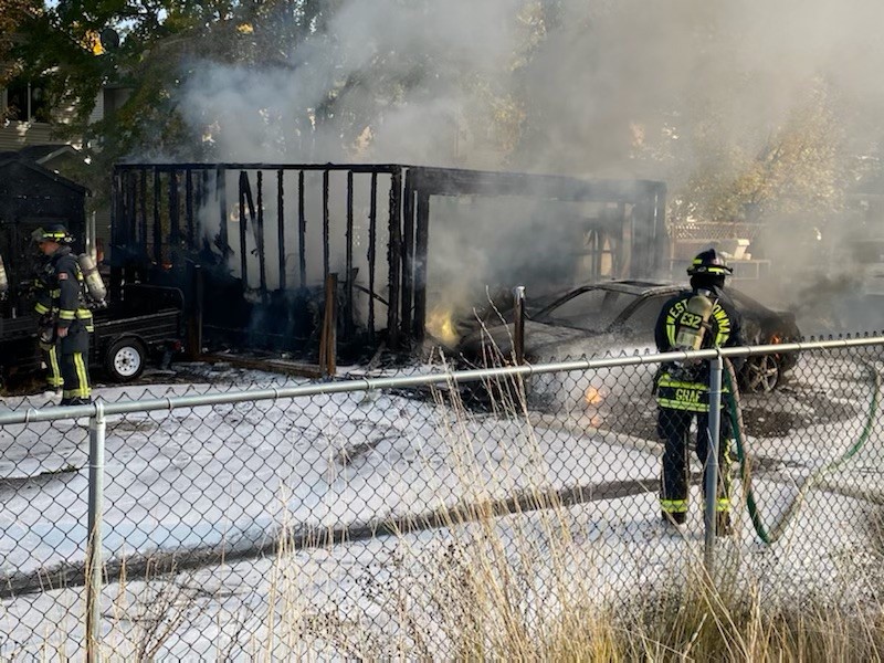 A garage and a vehicle were completely gutted in a structure fire on Horizon Drive in West Kelowna, B.C., on Sunday, Oct. 17, 2021.