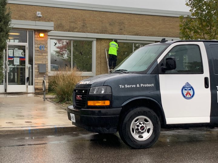 Investigators at the scene of the shooting.