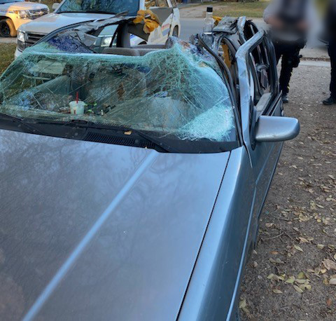 The car's roof was completely ripped off in a collision with a semi on highway 4.