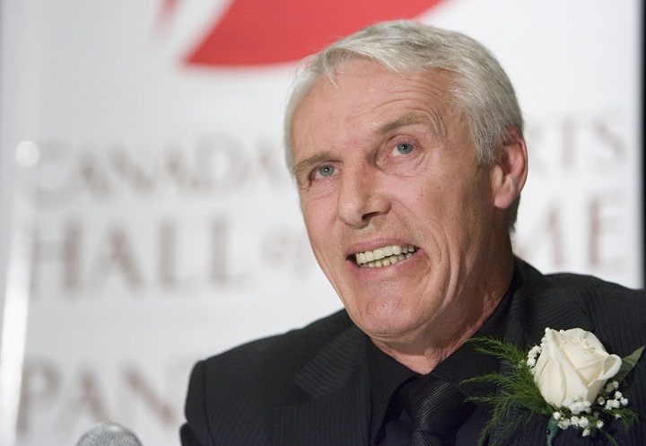 Canada's Sports Hall of Fame inductee, former hockey great Mike Bossy,  smiles during a news conference in Toronto on Thursday Oct. 25, 2007. 