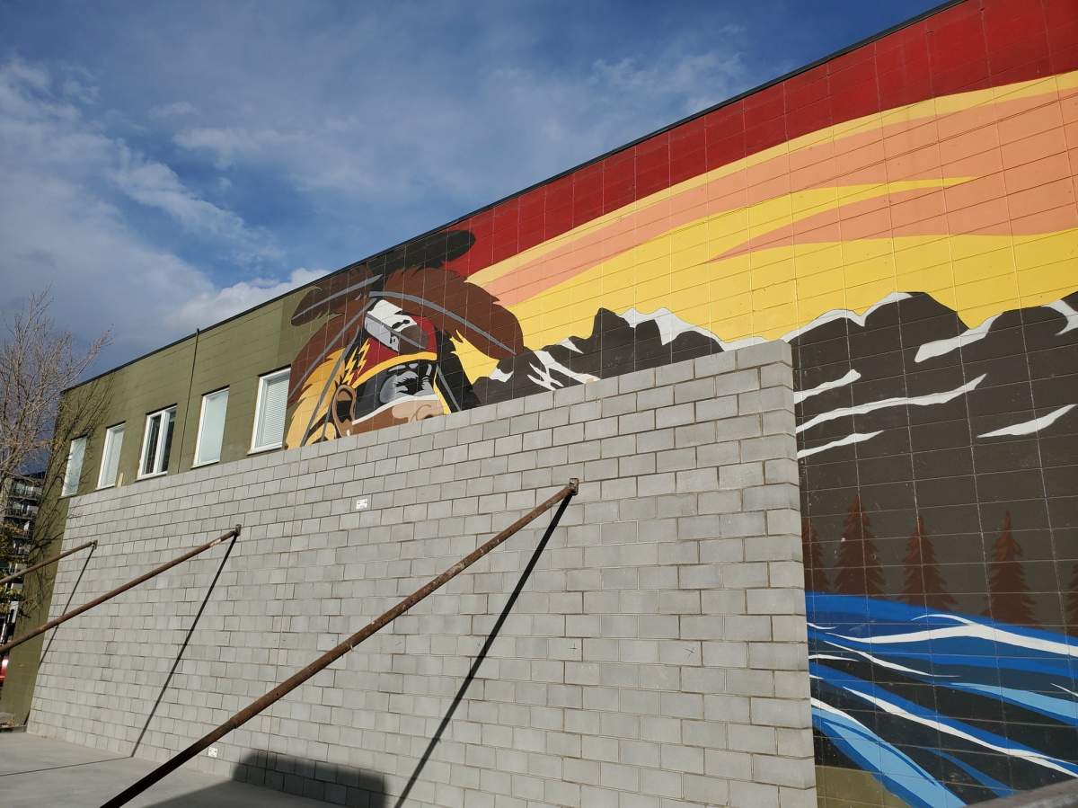 The mural on Calgary’s 17th Avenue covered by a brick wall.