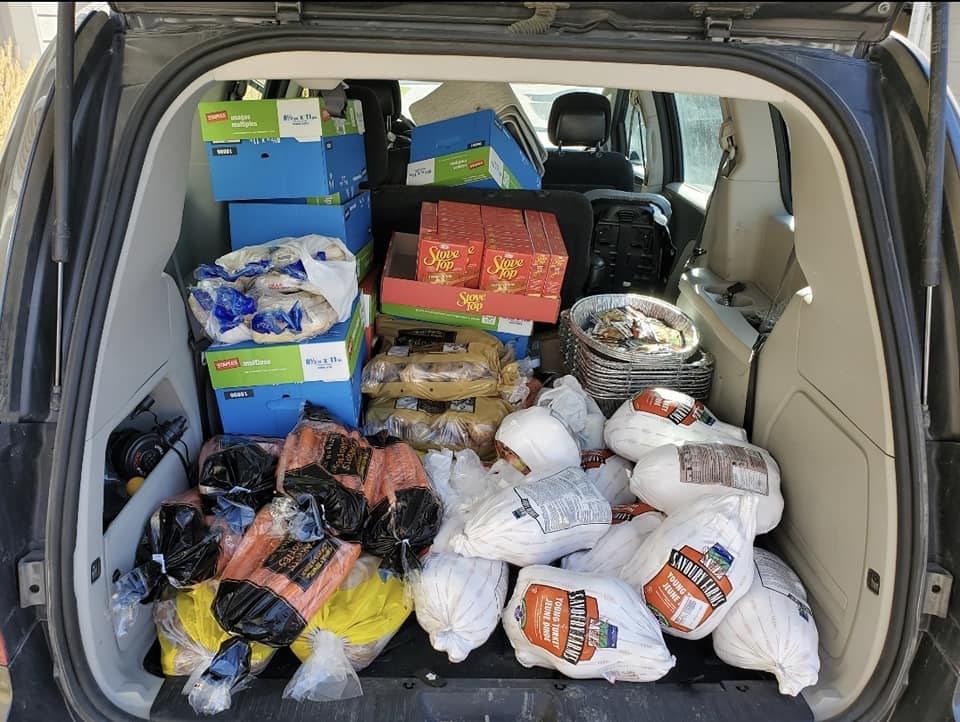 Brianna’s trunk filled with food for the boxes.