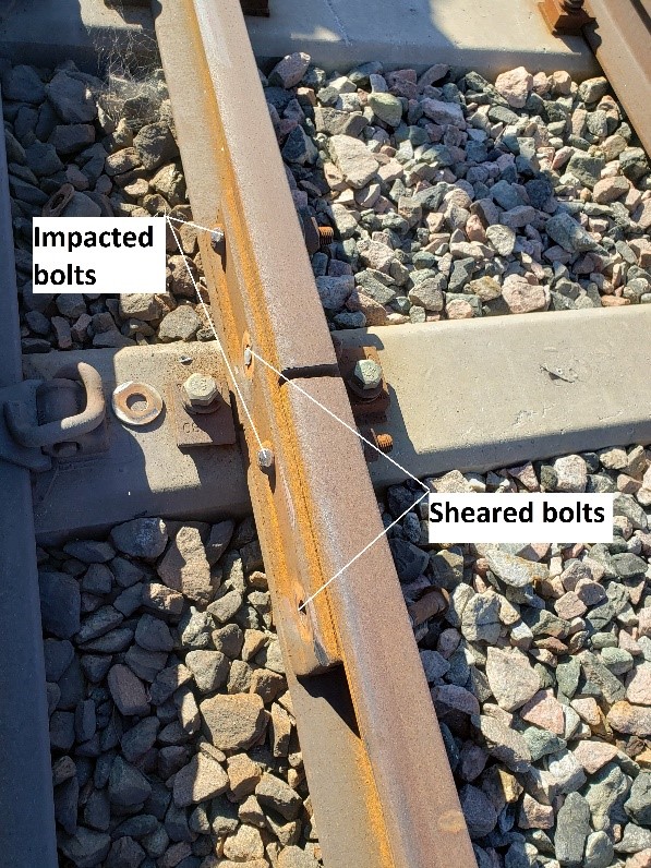 A TSB report shows damage to bolts on Confederation Line LRT rails outside Tremblay Station as a result of the derailment on 19 September 2021.