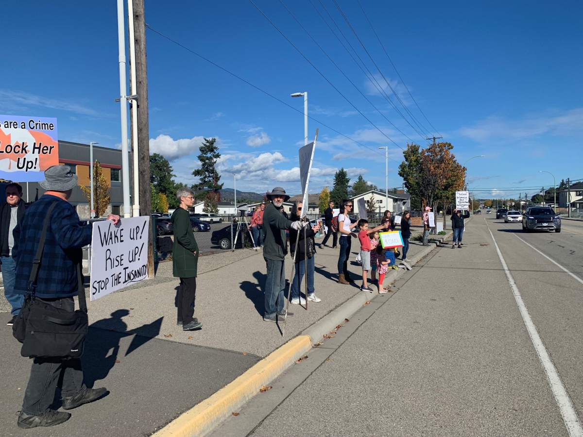 A small crowd gathered outside the Central Okanagan public schools office on Wednesday, Oct. 6, 2021 to rally against B.C.’s mask mandate for school-aged children.