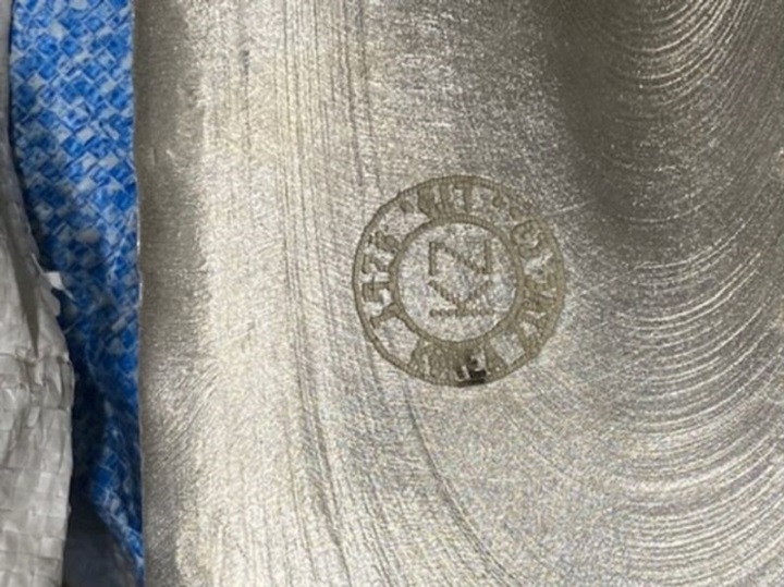 Silver ingot with distinctive stamp.