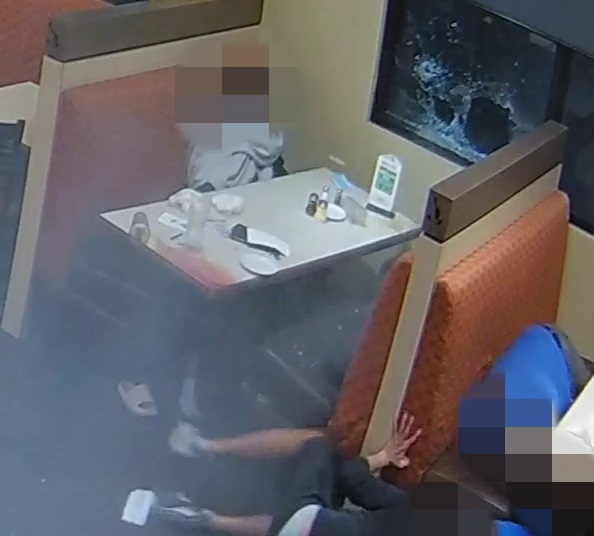 Edmonton police investigate a targeted shooting at Royal Pizza, located in the area of 12 Avenue and 101 Street SW, Friday, Oct. 8, 2021.