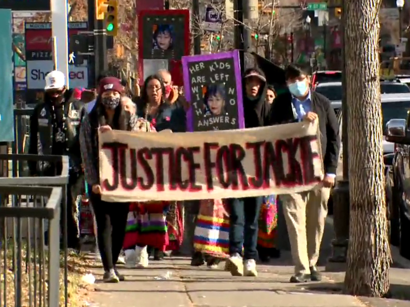 People walked through the streets of Calgary to honour Jackie Crazy Bull on Saturday, Oct. 16, 2021.